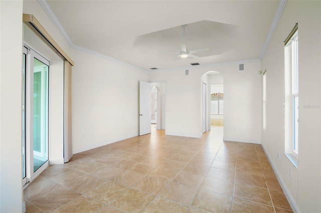 4941 Sabal Lake Cir, Sarasota, FL 34238 - spare room featuring arched walkways, a ceiling fan, crown molding, and baseboards