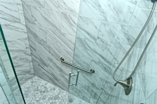 room details featuring a shower stall
