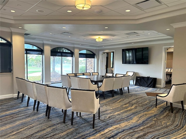 dining room with baseboards, a tray ceiling, dark colored carpet, crown molding, and recessed lighting