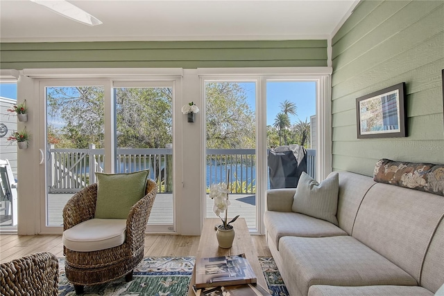 sunroom / solarium featuring plenty of natural light