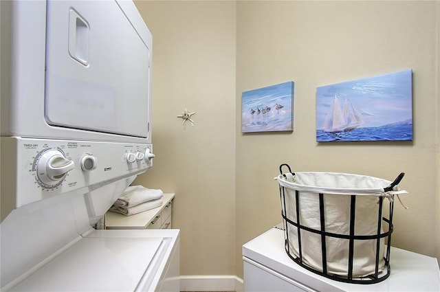 laundry area with laundry area and stacked washing maching and dryer