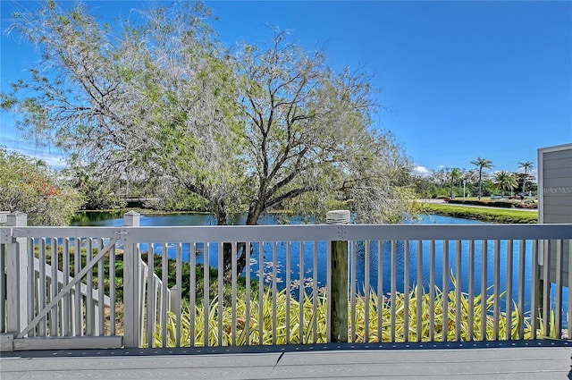 view of gate featuring a water view