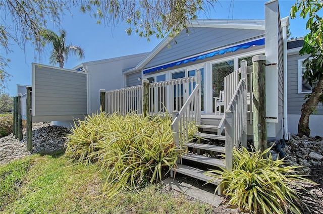 rear view of house with stairway