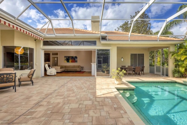 back of house featuring stucco siding, an outdoor hangout area, outdoor dining area, and a patio area