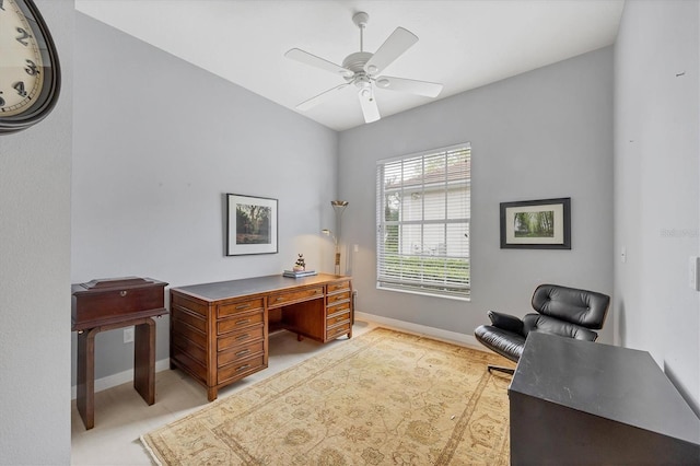 home office featuring baseboards and ceiling fan