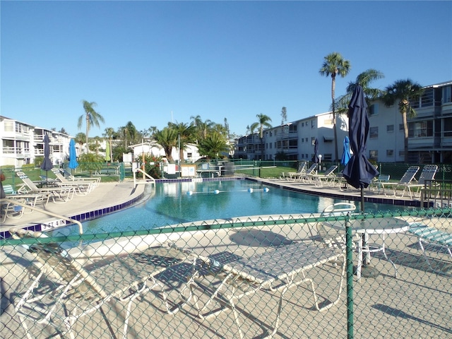 view of swimming pool featuring a patio