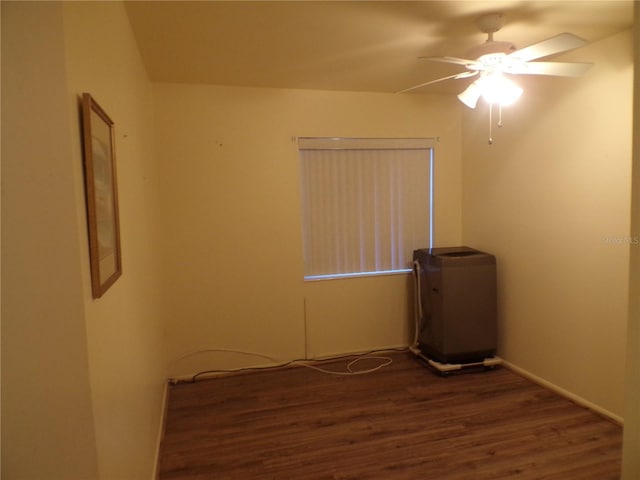 unfurnished room with ceiling fan and dark hardwood / wood-style floors