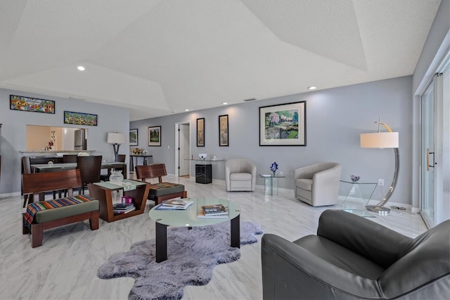 living area with lofted ceiling, marble finish floor, recessed lighting, and baseboards