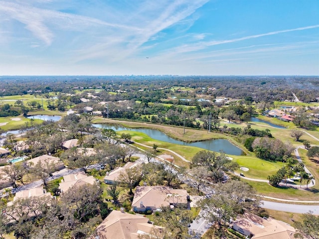 bird's eye view featuring a water view and a residential view