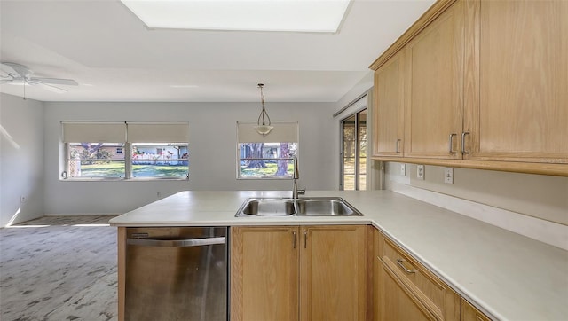 kitchen with light brown cabinetry, dishwasher, ceiling fan, sink, and kitchen peninsula