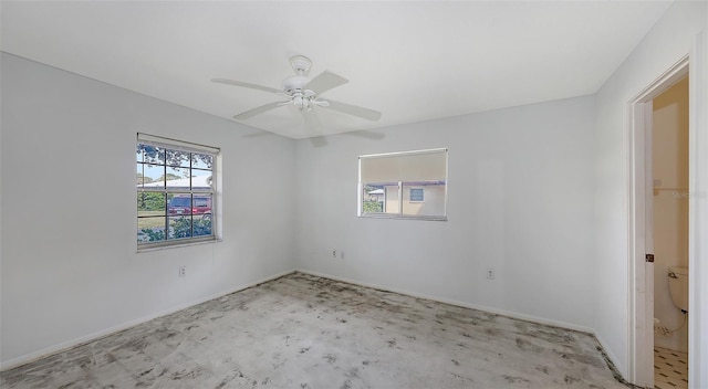 spare room with ceiling fan