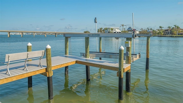 view of dock with a water view