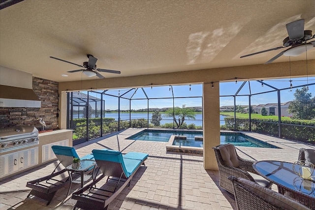 view of swimming pool with a water view, grilling area, and a patio