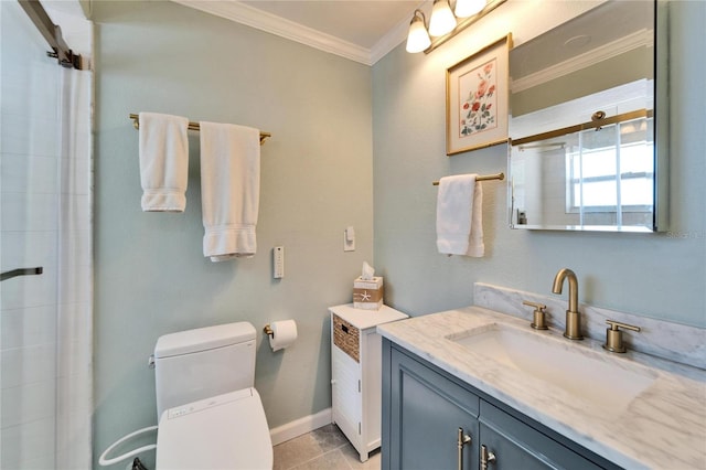 bathroom featuring tile patterned flooring, toilet, vanity, baseboards, and ornamental molding