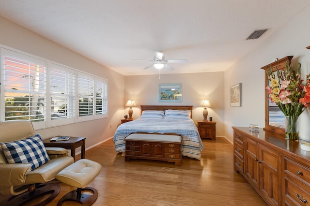 1528 43rd Avenue Dr W, Palmetto, FL 34221 - bedroom with visible vents, baseboards, a ceiling fan, and light wood-style flooring