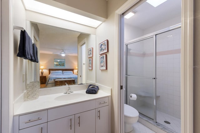 1528 43rd Avenue Dr W, Palmetto, FL 34221 - bathroom featuring ceiling fan, toilet, connected bathroom, vanity, and a stall shower