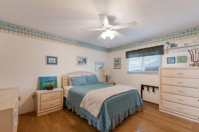 1528 43rd Avenue Dr W, Palmetto, FL 34221 - bedroom featuring a ceiling fan and wood finished floors