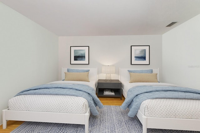 1528 43rd Avenue Dr W, Palmetto, FL 34221 - bedroom featuring visible vents and wood finished floors