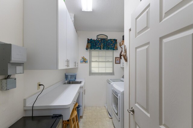 1528 43rd Avenue Dr W, Palmetto, FL 34221 - washroom featuring independent washer and dryer, a sink, light floors, and cabinet space