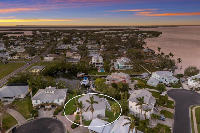 1528 43rd Avenue Dr W, Palmetto, FL 34221 - aerial view at dusk with a water view and a residential view