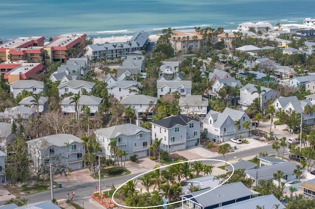 bird's eye view with a water view and a residential view