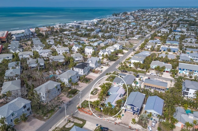 bird's eye view with a water view and a residential view