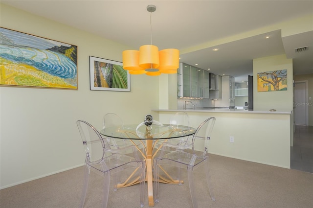 dining space with carpet, visible vents, baseboards, and recessed lighting