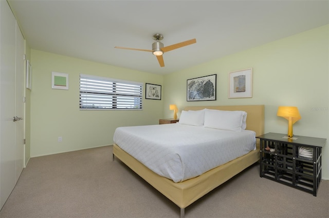 bedroom with carpet floors and a ceiling fan