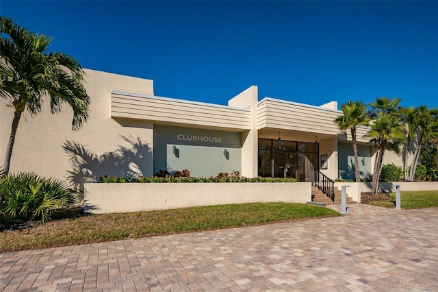 view of front of house featuring stucco siding