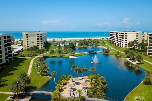 drone / aerial view with a water view