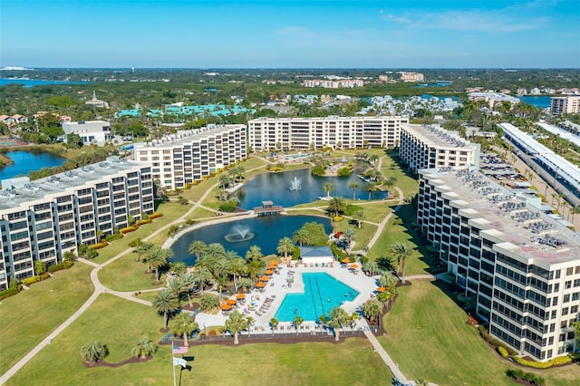 birds eye view of property featuring a water view