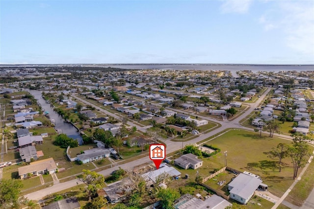 birds eye view of property with a residential view