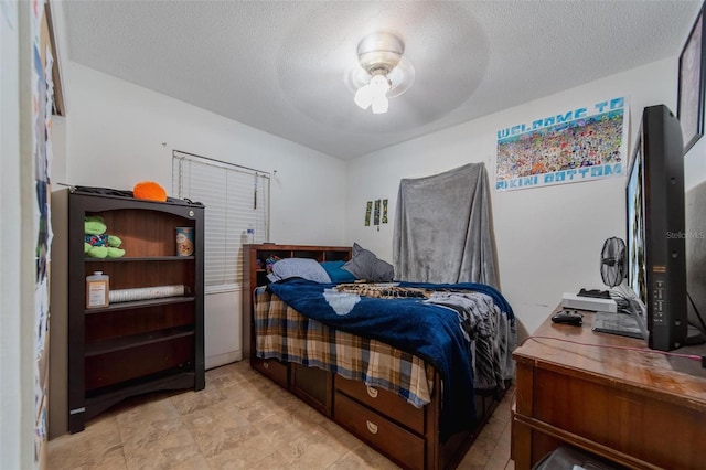 bedroom featuring a textured ceiling