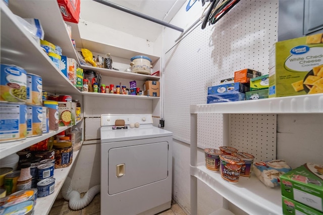 laundry room featuring washer / clothes dryer and laundry area