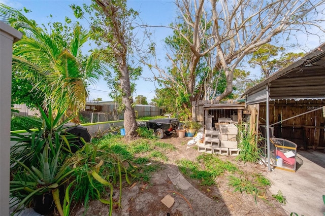 view of yard featuring a patio area and a fenced backyard