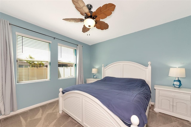 bedroom featuring ceiling fan and carpet floors