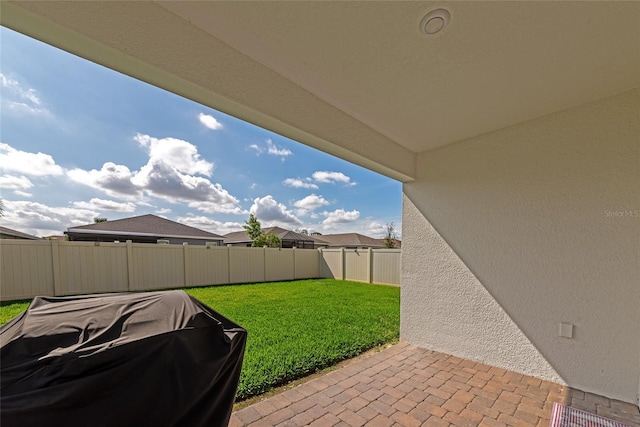 view of yard with a patio area