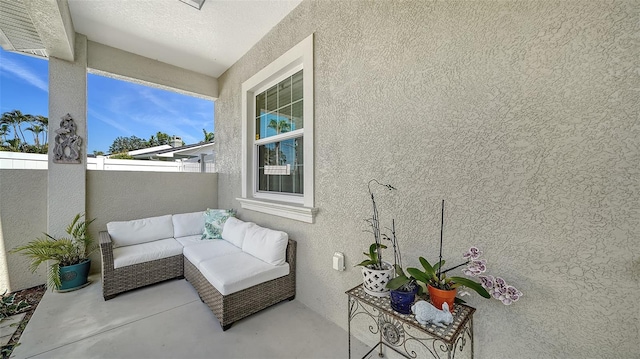 view of patio / terrace with fence and an outdoor hangout area