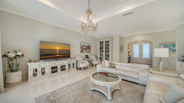 living room featuring visible vents, ornamental molding, french doors, a raised ceiling, and an inviting chandelier