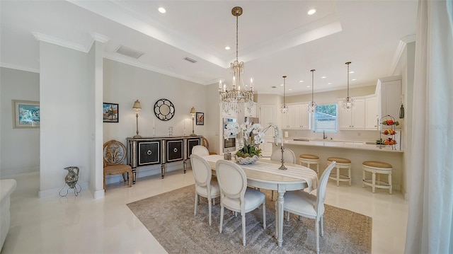 dining room with visible vents, a tray ceiling, crown molding, and recessed lighting