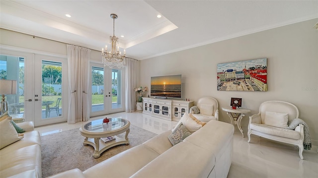 living area featuring a tray ceiling, french doors, recessed lighting, and crown molding