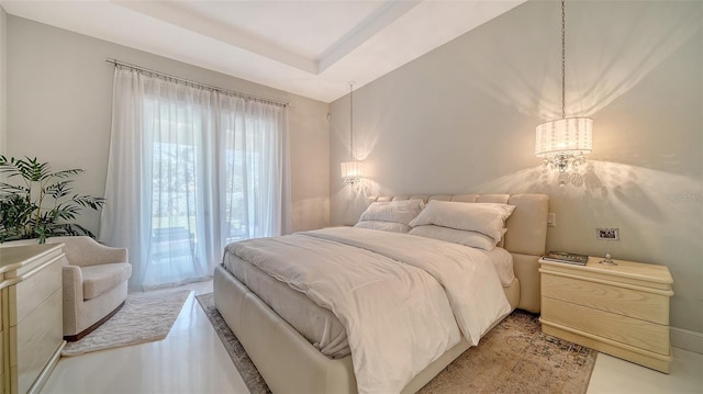 bedroom featuring a tray ceiling