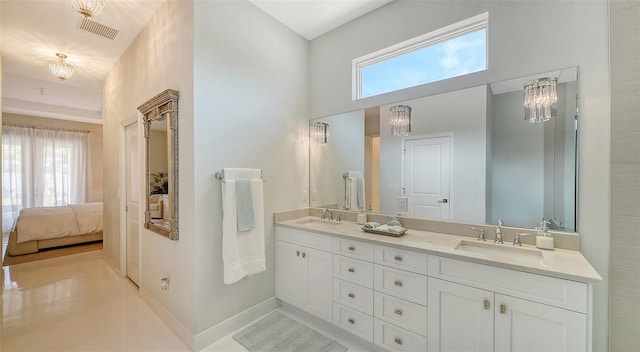 bathroom with visible vents, a sink, ensuite bath, and double vanity