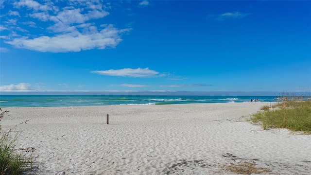 property view of water with a beach view