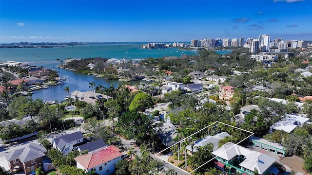 aerial view featuring a water view and a city view