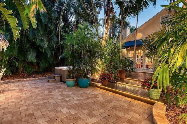 view of patio / terrace featuring a hot tub