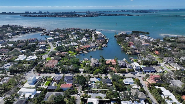 bird's eye view featuring a residential view and a water view