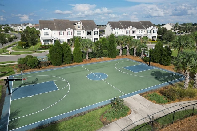 view of basketball court featuring community basketball court and a residential view