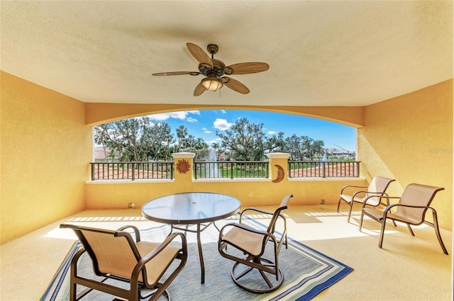 view of patio with ceiling fan