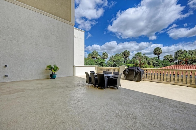 view of patio / terrace with outdoor dining space and grilling area